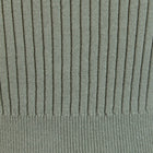 Detail of the ribbed knit texture on a long sleeve top