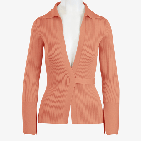 Front view of the Women's Delancey Wrap Sweater featured in a vibrant peach color