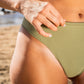 Close up of a woman's bikini that shows how its knitted sustainability and fashion