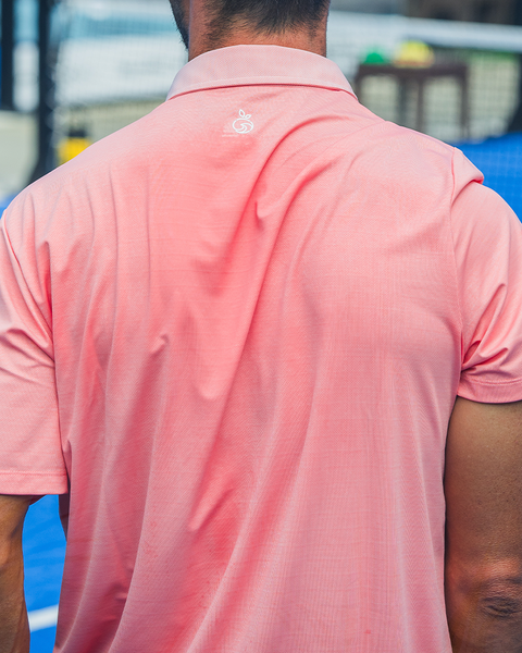 Back of a man wearing a polo shirt