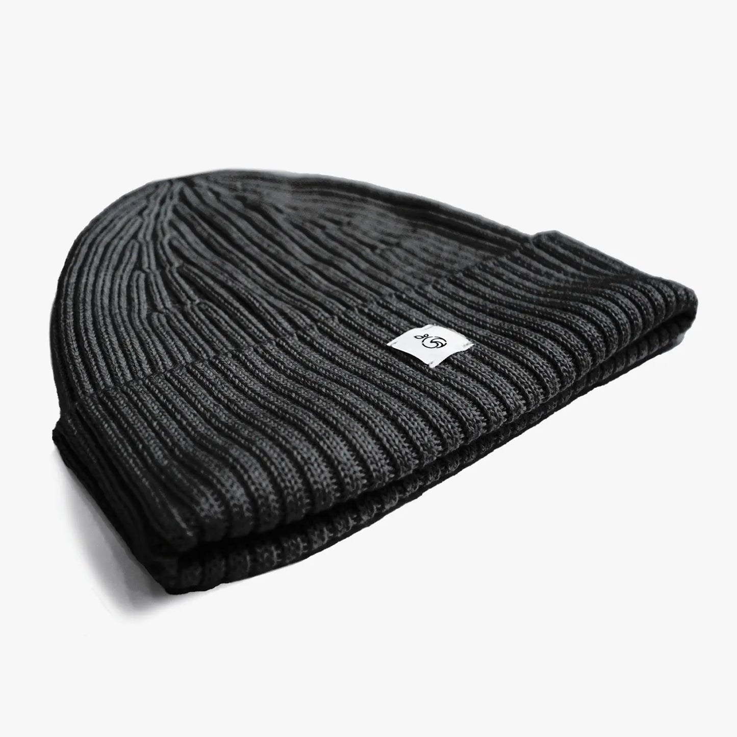 Unisex seamless ribbed beanie made with No Itch Merino Wool soft knit in black