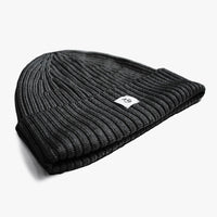 Unisex seamless ribbed beanie made with No Itch Merino Wool soft knit in black
