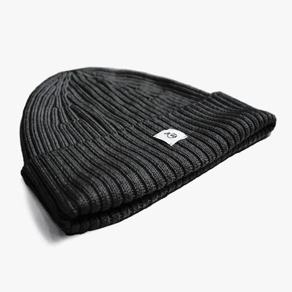 Unisex seamless ribbed beanie made with No Itch Merino Wool soft knit in black