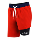 Close-up of Boys Red Wave swim trunks with logo detail on liner