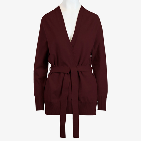 The Women's Callie Long Sleeve Front Tie Sweater in a rich burgundy color modeled on a white mannequin